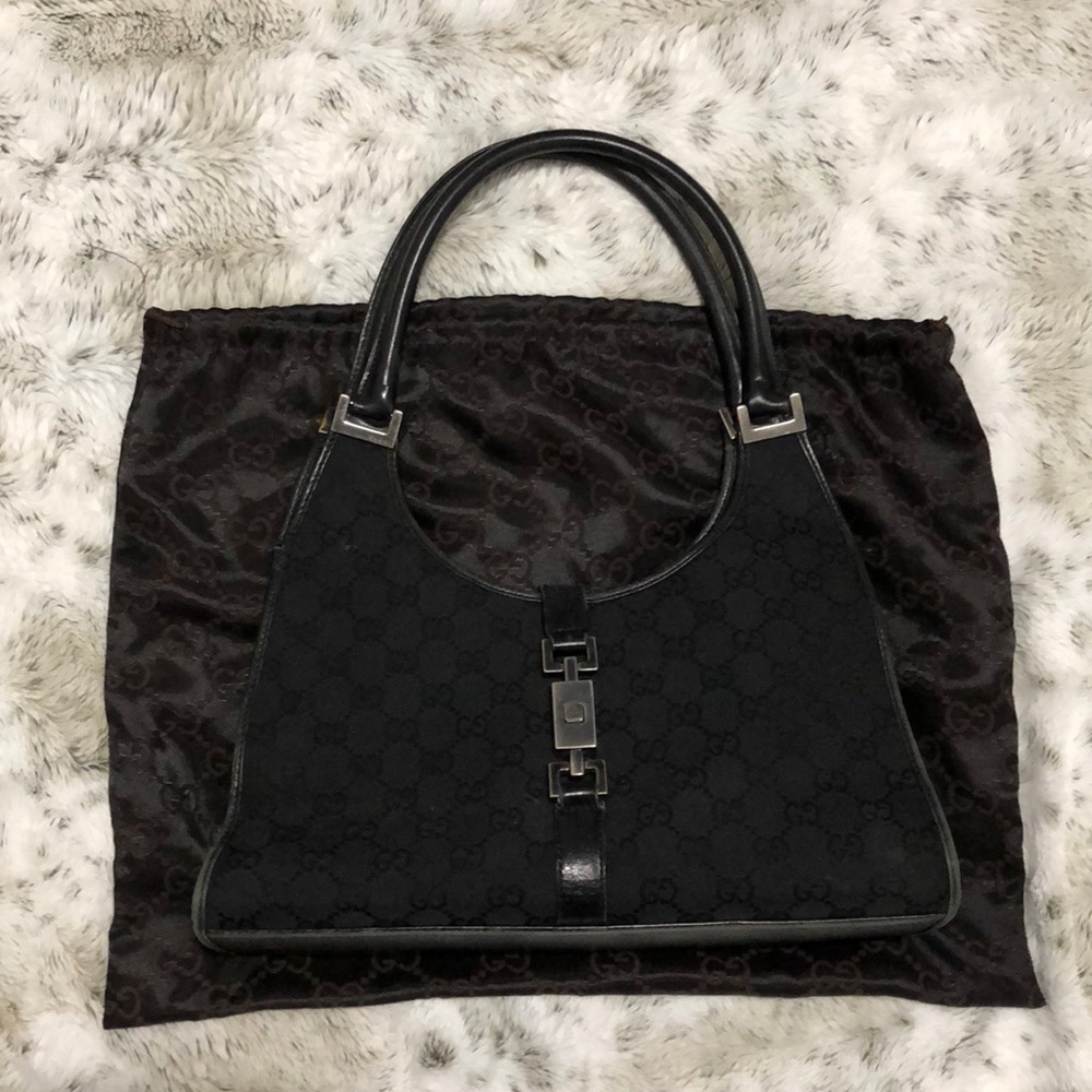 Black Gucci logo bag